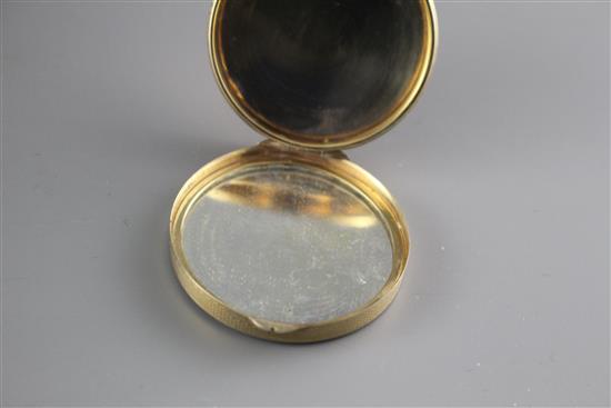 A George V engine turned 9ct gold circular compact, London, 1928, 38mm, gross 21.8 grams.